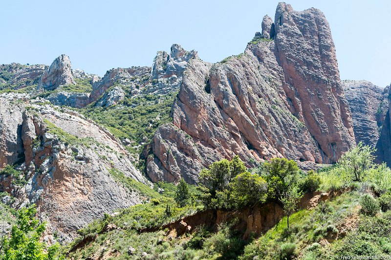 20160601_141424 D4S.jpg - Mallos de Riglos are a set of huge red rock formations that rise up as pillars up to 1000 feet in height.  Its a popular rock climbing place.  Located near Riglos about 25 miles from city of Huesca